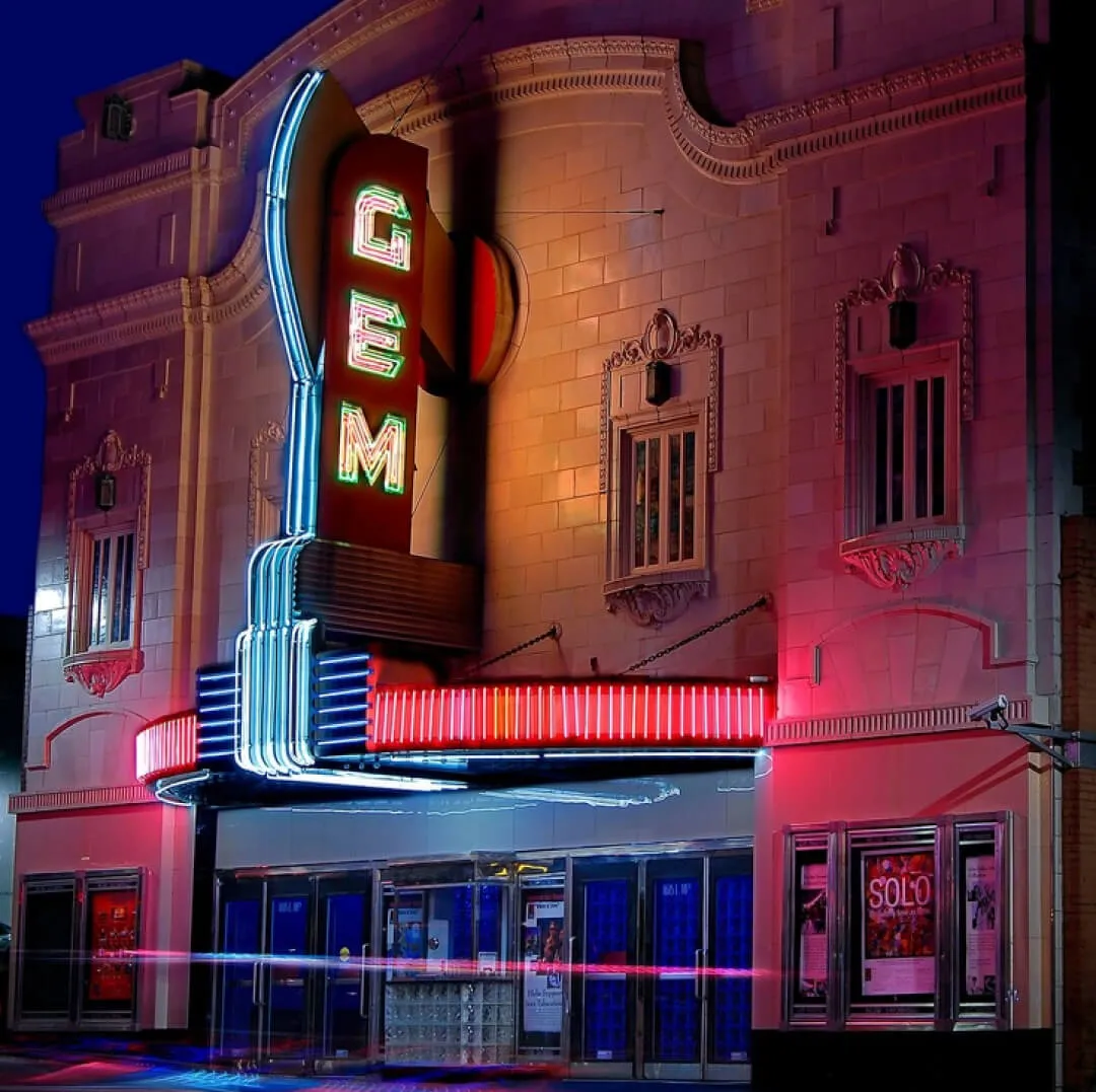The Gem Theater neon marquee at night